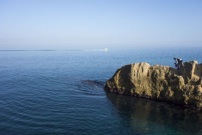 Scenic view of sea against clear sky