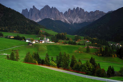 Scenic view of landscape and mountains against sky