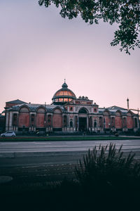 View of buildings against sky at sunset