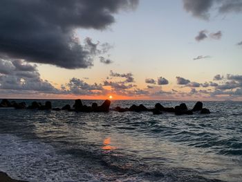 Scenic view of sea against sky during sunset