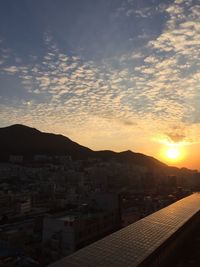 View of cityscape at sunset