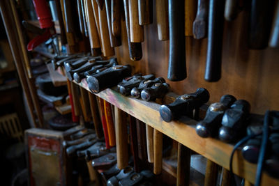 Close-up of shelves with hammers