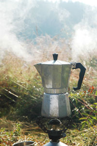 Coffee maker and camping stove in the outdoors