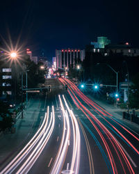 High angle view of light trails on road at night