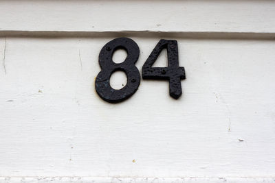 Close-up of text on wall