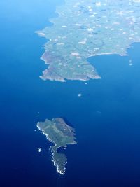 Aerial view of sea and swimming underwater