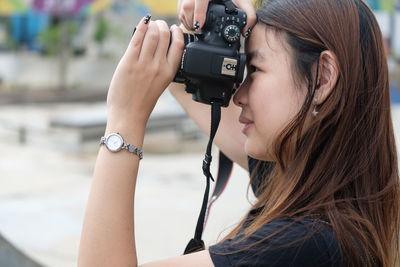 Midsection of man photographing