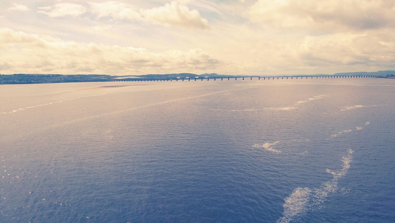 water, sky, sea, cloud - sky, tranquility, tranquil scene, scenics, cloudy, beach, beauty in nature, nature, cloud, waterfront, sand, horizon over water, shore, idyllic, day, outdoors, rippled