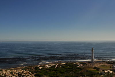 High view of lighthouse on beach