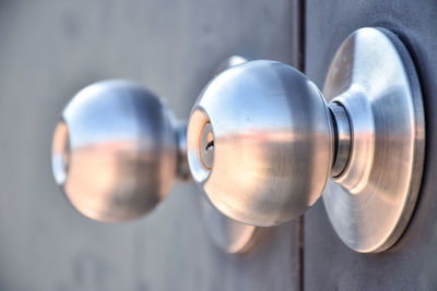 Knobs of the door.