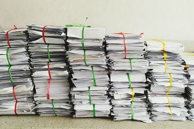 Stack of papers against wall