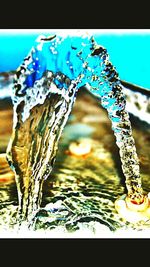 Close-up of water against blue sky