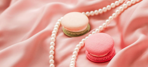 Close-up of wedding rings on table