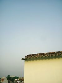 Low angle view of roof against clear sky
