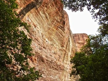 Scenic view of cliff against sky