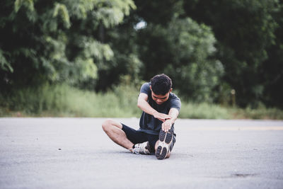 Man riding motorcycle on road