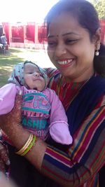 Portrait of happy mother and daughter