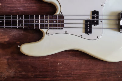 High angle view of guitar on table