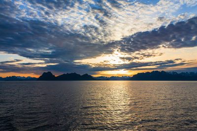 Sunset view at the rocky coastline in lofoten, norway