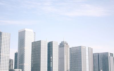 Skyscrapers in city against sky