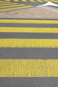 High angle view of yellow markings on road