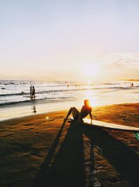 Silhouette of people on beach