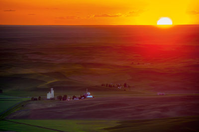 Scenic view of steptoe butte against sky during sunset