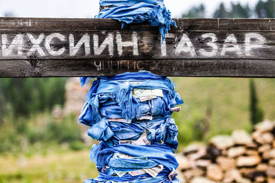 Close-up of text on wood