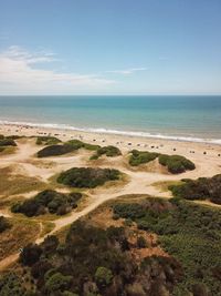 Scenic view of beach against sky