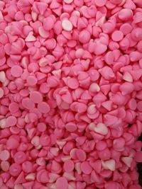 Full frame shot of heart shape over pink background
