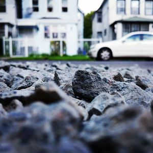 Surface level of cobblestone street in city