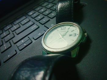 Close-up of clock on wall