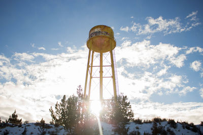 Low angle view of water tower against sky