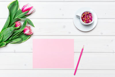 Directly above shot of pink flowers on table