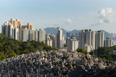 Panoramic view of city buildings against sky