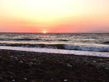 Scenic view of sea at sunset