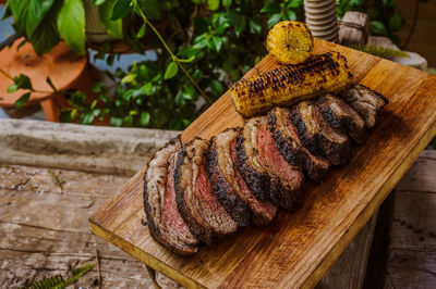 Close-up of meat on barbecue grill