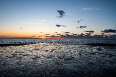 Scenic view of sea against sky during sunset