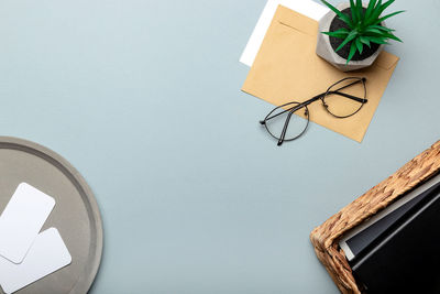 Directly above shot of objects on blue background