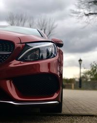 Close-up of car against sky