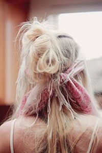 Rear view of woman with tousled hair