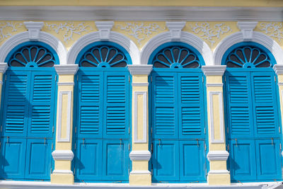 Full frame shot of blue windows on building