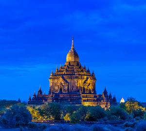 View of temple building against blue sky