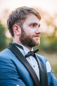 Close-up of young man looking away