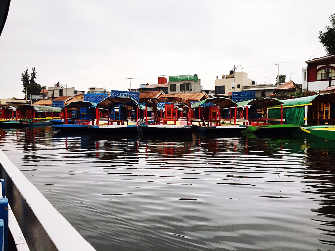 Building Exterior Reflection Water Transportation Built Structure Architecture Nautical Vessel Mode Of Transport Outdoors Waterfront Canal Moored Sky Day Trajineras Colorful EyeEmNewHere