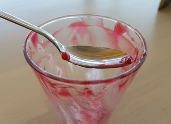 High angle view of drink in glass on table