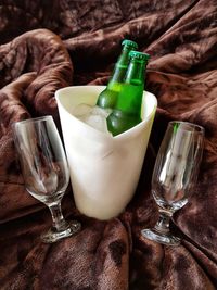 Close-up of wine bottles on table