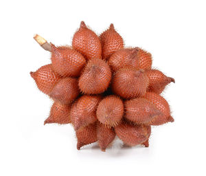 Close-up of strawberry over white background