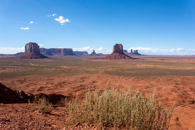 Rock formations on landscape against sky