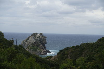 Scenic view of beach and sea against sky